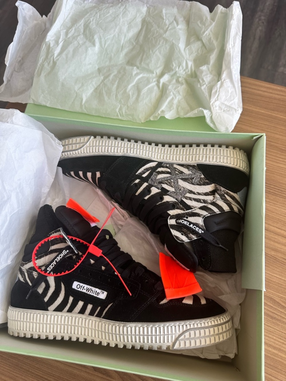 Off-White Black White Zebra High-Top Sneakers with Orange Zip Tie